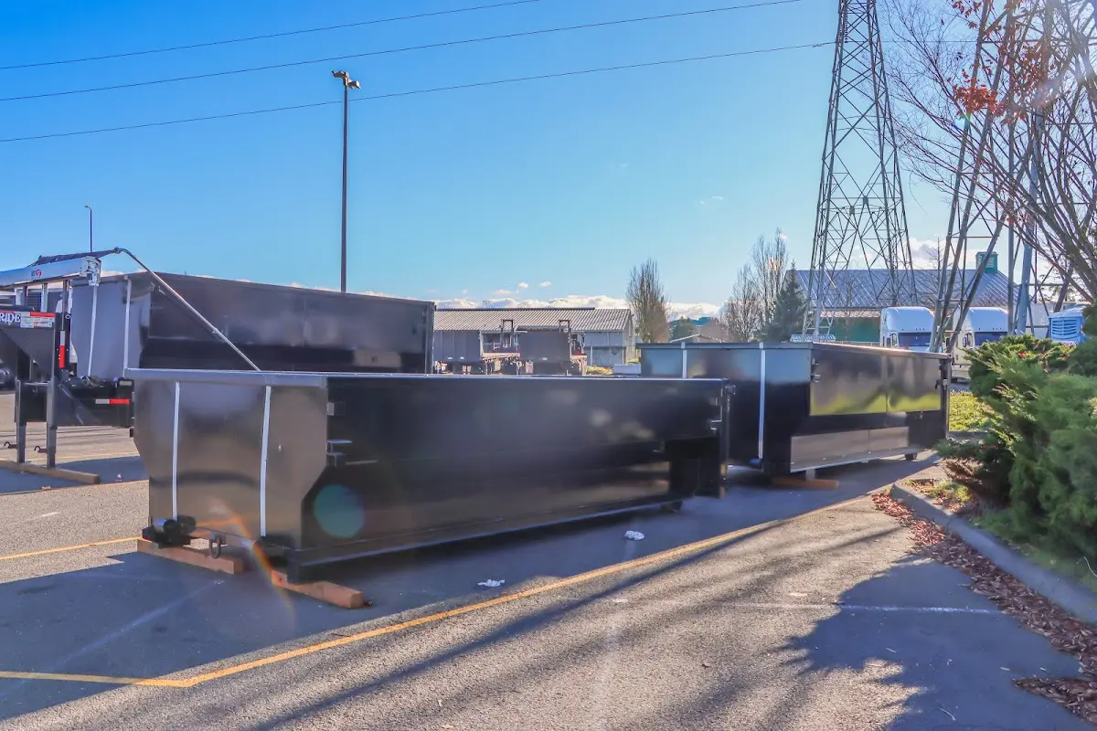 Roll-off dumpster ready for waste disposal at job site for 2 Yard Dumpster Rental in Yosemite Lakes